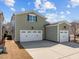 View of detached garage with multiple bays and a spacious driveway at 1086 Tender Dr, Apex, NC 27502