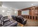 A home theater with plush leather seating, a large screen, and custom built-in cabinetry at 1086 Tender Dr, Apex, NC 27502