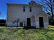 Back of home featuring backyard access, A/C unit, and plenty of sunlight at 1104 Thelonious Dr, Raleigh, NC 27610