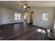 Bright living room with high ceilings and modern dark wood flooring at 1104 Thelonious Dr, Raleigh, NC 27610