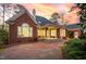 Beautiful brick home featuring a large patio and backyard perfect for entertaining at 112 Trellingwood Dr, Morrisville, NC 27560
