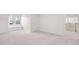 Bright, neutral bedroom offering natural light, creating a calm and serene atmosphere at 112 Trellingwood Dr, Morrisville, NC 27560
