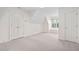 Bedroom with carpet, window and double door closet at 112 Trellingwood Dr, Morrisville, NC 27560