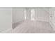 Bright carpeted bedroom leading to a bathroom at 112 Trellingwood Dr, Morrisville, NC 27560