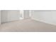 View of a carpeted bedroom leading to an ensuite bathroom at 112 Trellingwood Dr, Morrisville, NC 27560