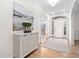 Elegant foyer features a neutral palette, hardwood floors, and stylish decor at 112 Trellingwood Dr, Morrisville, NC 27560