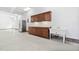Spacious garage with built-in cabinets and sink area offers great storage at 112 Trellingwood Dr, Morrisville, NC 27560