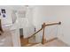 Hallway with wood railing and modern lighting at 112 Trellingwood Dr, Morrisville, NC 27560