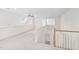 Loft space with view of the stairs at 112 Trellingwood Dr, Morrisville, NC 27560