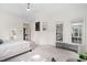 Spacious bedroom features a sitting area, built-in shelves and neutral decor at 112 Trellingwood Dr, Morrisville, NC 27560