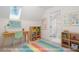 Charming playroom with a skylight, desk, and educational decor, ideal for learning and fun at 112 Trellingwood Dr, Morrisville, NC 27560
