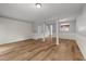 Large basement featuring modern flooring, white wainscoting, and neutral paint at 116 Anterbury Dr, Apex, NC 27502