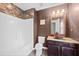 Beautiful bathroom featuring tiled shower and a unique sink with decorative tiling at 116 Anterbury Dr, Apex, NC 27502