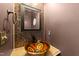 Bathroom vanity area features an ornate sink, mosaic tile backsplash and modern fixtures at 116 Anterbury Dr, Apex, NC 27502