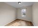 Bright bedroom with neutral walls, hardwood floors and lots of natural light at 116 Anterbury Dr, Apex, NC 27502