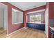 Features include a built-in blue hutch and mosaic tile backsplash under the window at 116 Anterbury Dr, Apex, NC 27502