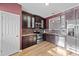 Kitchen featuring dark wood cabinets, and stainless steel appliances at 116 Anterbury Dr, Apex, NC 27502