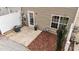 Private patio with white fencing and a small yard at 116 Anterbury Dr, Apex, NC 27502