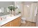 Well-lit bathroom with modern vanity, stylish decor, and a shower-tub combo at 1301 Durlain Dr # 108, Raleigh, NC 27614