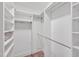 Spacious walk-in closet with custom shelving and ample storage space at 138 Tressel Way, Durham, NC 27707