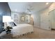 Cozy main bedroom featuring plush carpeting, shuttered windows and neutral decor at 138 Tressel Way, Durham, NC 27707