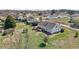 Expansive backyard featuring a wooden deck, well-maintained lawn, and recreational equipment, creating an ideal outdoor living space at 1408 Harvey Johnson Rd, Raleigh, NC 27603