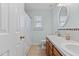 Bathroom with tiled floor, window, and bathtub-shower combination at 1408 Harvey Johnson Rd, Raleigh, NC 27603