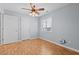 Cozy bedroom with hardwood floors and natural light at 1408 Harvey Johnson Rd, Raleigh, NC 27603