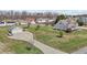 Large lot featuring detached garage with long driveway and a spacious, grassy yard perfect for recreation and relaxation at 1408 Harvey Johnson Rd, Raleigh, NC 27603