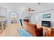 Cozy living room featuring an electric fireplace, bar seating, and plenty of space to relax at 1408 Harvey Johnson Rd, Raleigh, NC 27603