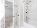 Bathroom with tub and shower, as well as entry to bedroom and closet at 1515 Edgeside Ct, Raleigh, NC 27609