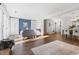 Spacious and open-concept living room with dining area, hardwood floors and neutral colors at 1515 Edgeside Ct, Raleigh, NC 27609