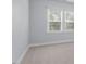 Empty bedroom featuring neutral carpet and bright window at 1564 Highpoint St, Wake Forest, NC 27587