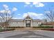 Community pool house featuring neutral colors, complemented by a pool and lush landscaping for relaxation at 1564 Highpoint St, Wake Forest, NC 27587