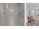 Shower with a white grab bar and shower head at 1855 W West River Rd, Franklinton, NC 27525