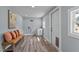 Bright laundry room with storage, sink, and seating at 1855 W West River Rd, Franklinton, NC 27525
