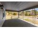 Covered porch with metal railing and view of yard at 1855 W West River Rd, Franklinton, NC 27525