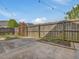 Well-maintained backyard featuring a wooden fence and a charming garden at 200 Indian Branch Dr, Morrisville, NC 27560
