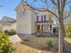 Charming two-story home with a red-shuttered front window and well-maintained landscaping at 200 Indian Branch Dr, Morrisville, NC 27560