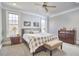Serene bedroom with plush carpeting, natural light, and comfortable furnishings at 203 Valleyshire Rd, Durham, NC 27707
