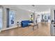 Bright living room with hardwood floors, contemporary lighting, and comfortable seating at 207 Lewey Brook Dr, Cary, NC 27519