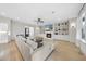 Spacious living room featuring a fireplace, built-in shelves, and an open floor plan at 2073 Amalfi Pl, Apex, NC 27502