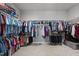 Spacious walk-in closet with ample shelving and hanging space at 2073 Amalfi Pl, Apex, NC 27502