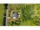 Beautifully landscaped property with lush green grass, manicured shrubs and mature trees at 212 Whirlaway Ln, Chapel Hill, NC 27516