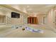 Finished basement featuring carpet, mirrors, and workout area at 212 Whirlaway Ln, Chapel Hill, NC 27516