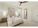 Light and airy main bedroom with stylish decor and an ensuite bathroom at 212 Whirlaway Ln, Chapel Hill, NC 27516