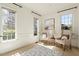 Bright sitting room featuring ample natural light and neutral decor at 212 Whirlaway Ln, Chapel Hill, NC 27516