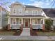 Charming two-story home featuring a welcoming front porch, craftsman columns and fresh landscaping at 2224 Karns Pl, Raleigh, NC 27614