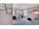 Cozy Bedroom with a white crib, playful decor, and soft pink accents at 230 Tidal Pool Way, Cary, NC 27519