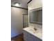 Clean and bright bathroom with a vanity, mirror, and shower providing essential amenities at 30 Jamestown Ct Ct, Zebulon, NC 27597
